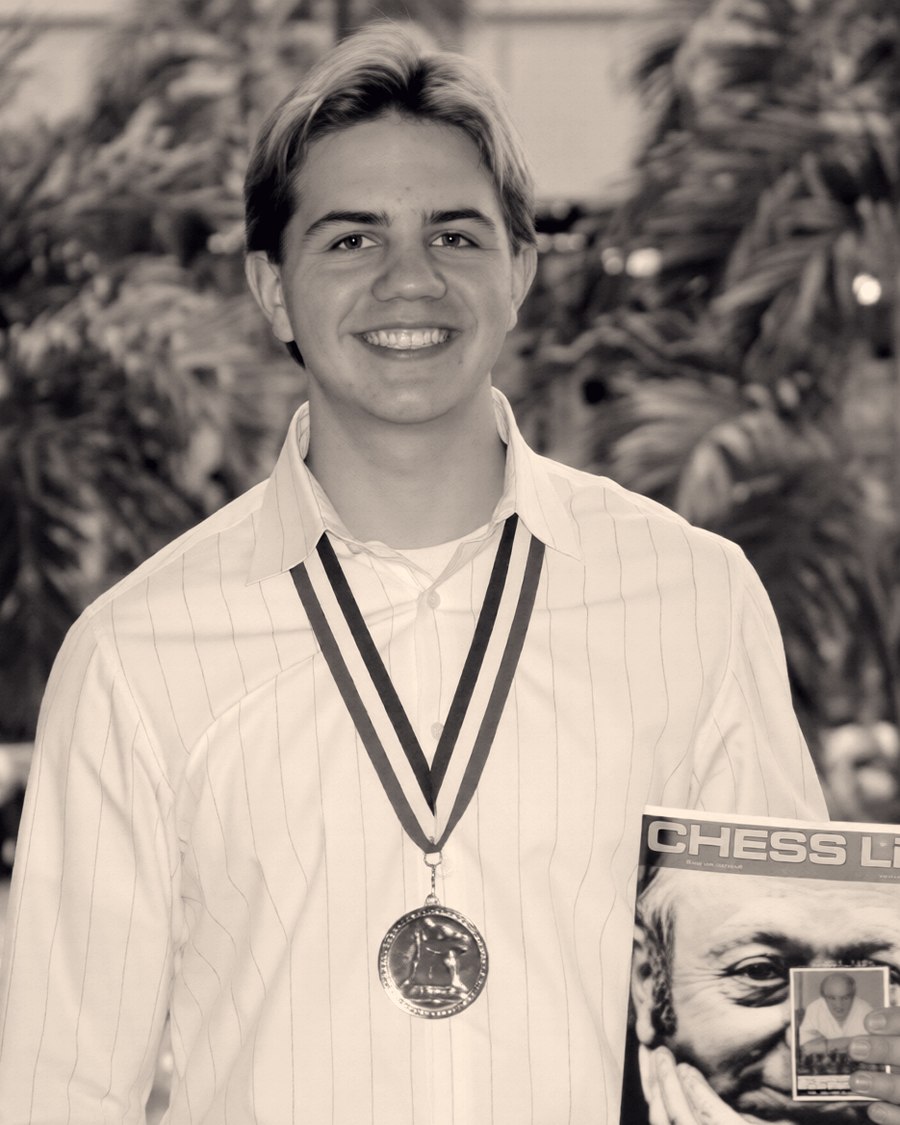 Carl Vellotti wearing the Denker Tournament of High School Champions medal.