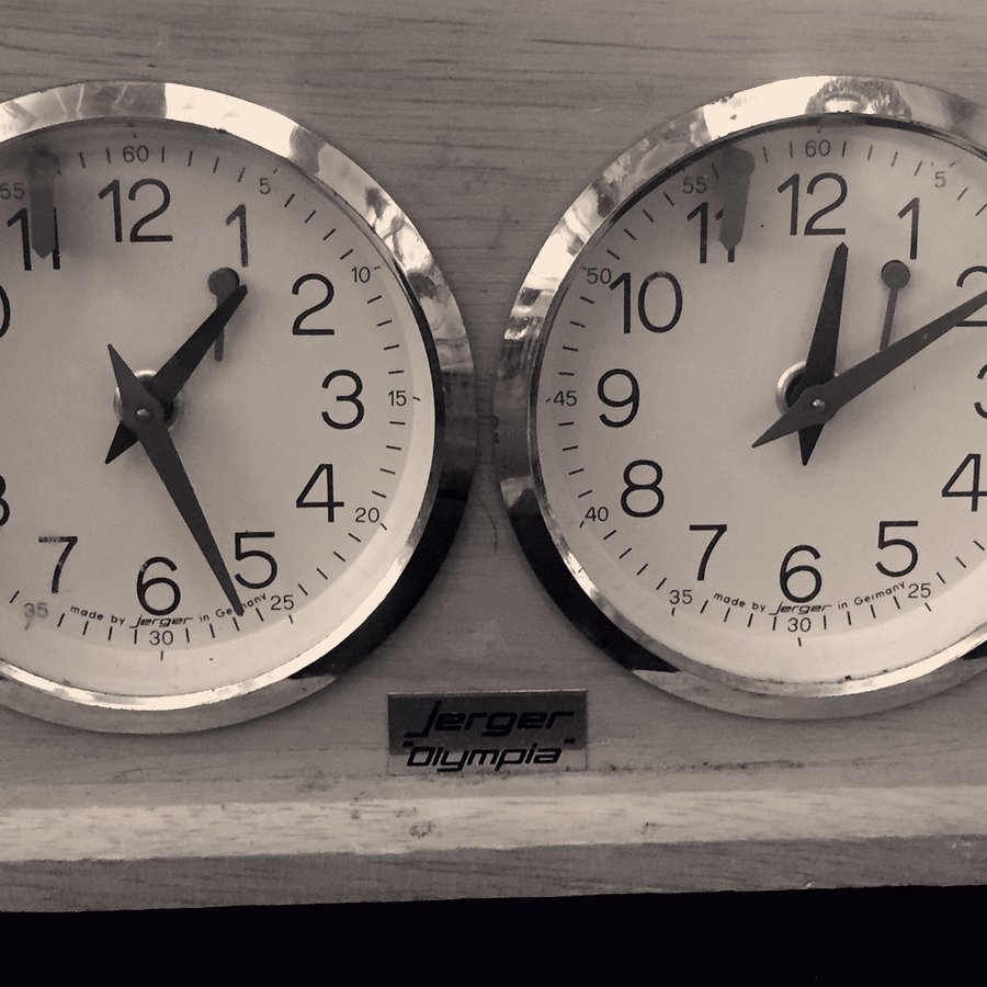 The two dials of a Jerger Olympia mechanical chess clock.
